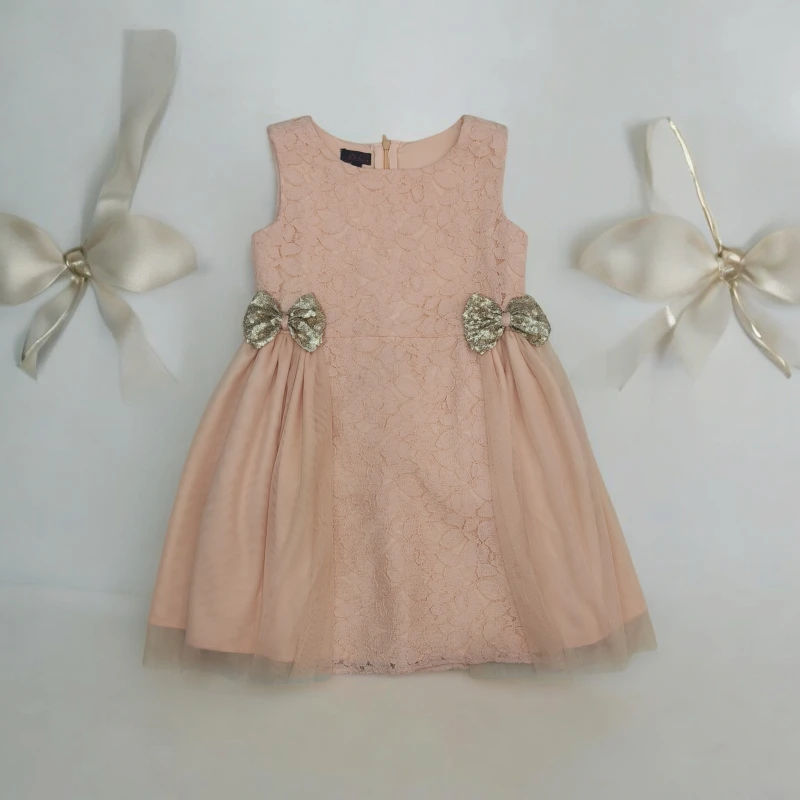 Peach Frock with Golden bow