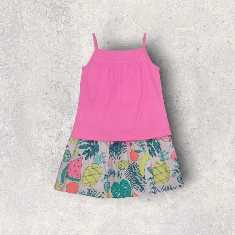 Hot pink top with fruits print skirt