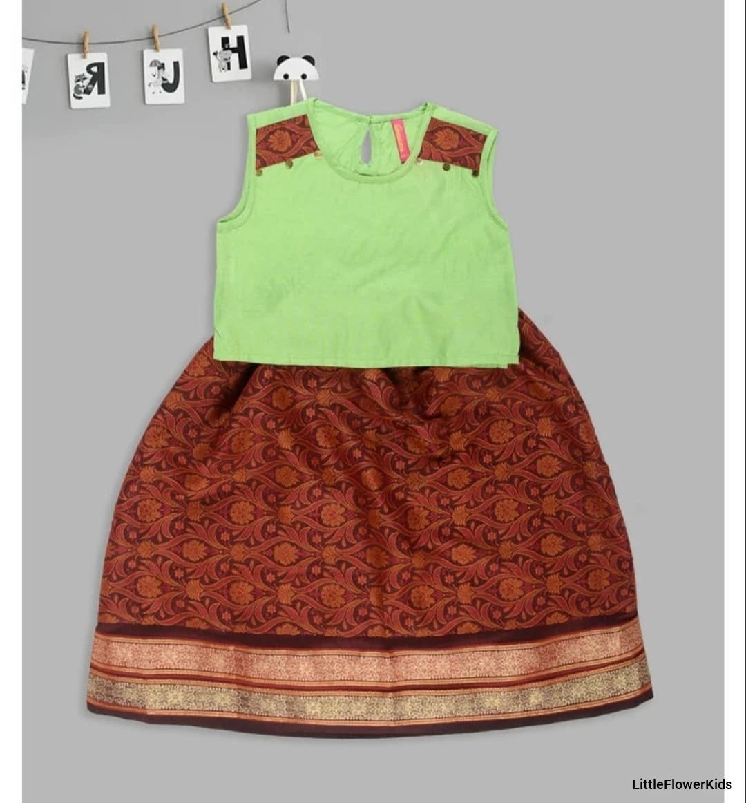Green top with jari printed brown skirt