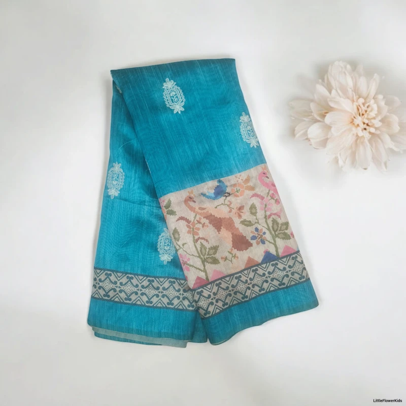 Blue Tissue saree with peacock printed border and embroidery work